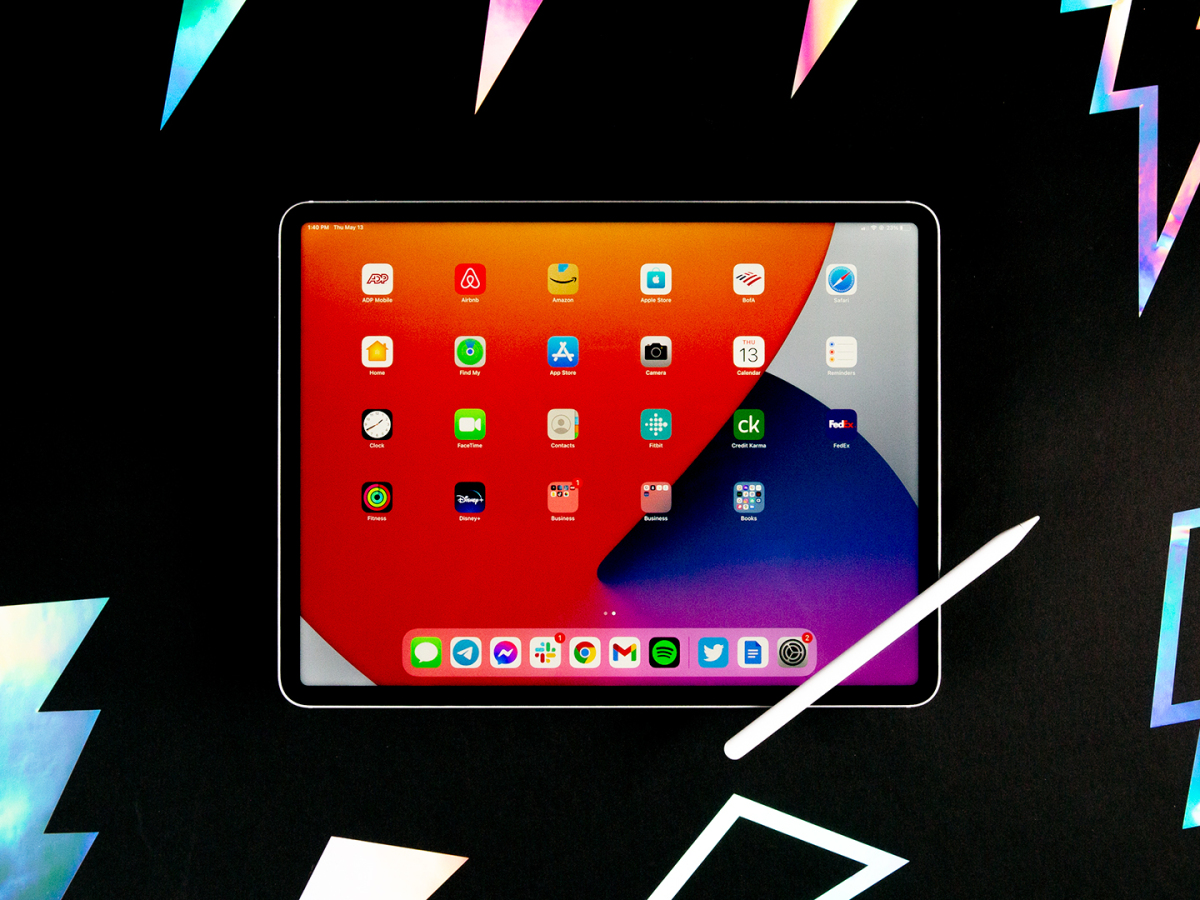 iPad Pro floating, showing a vivid display